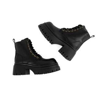 YX832 Garrapata Botin Sintético Negro